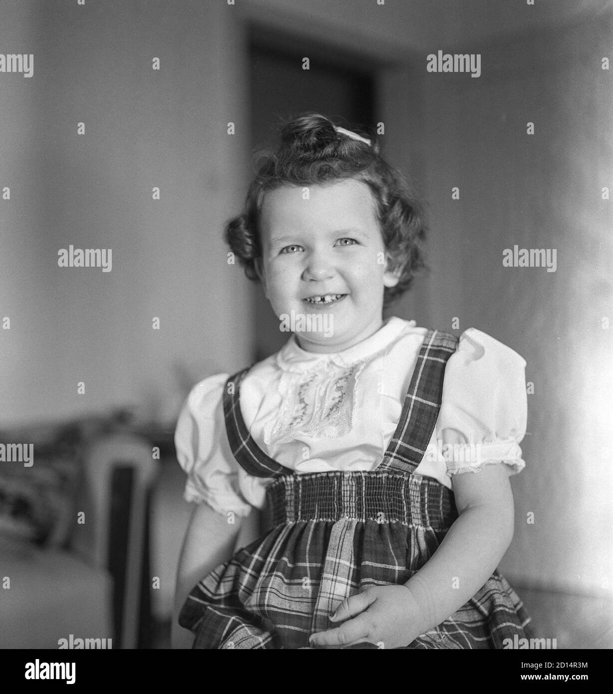 Vintage 1950s Lifestyle , Two Year Old Girl Poses for Camera in her ...
