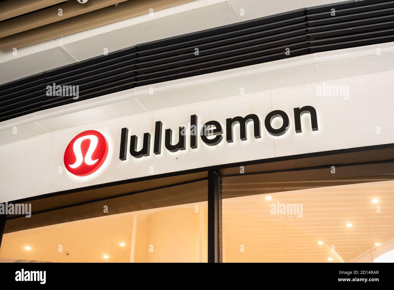 Canadian athletic apparel retailer, Lululemon logo seen at a store. Stock Photo