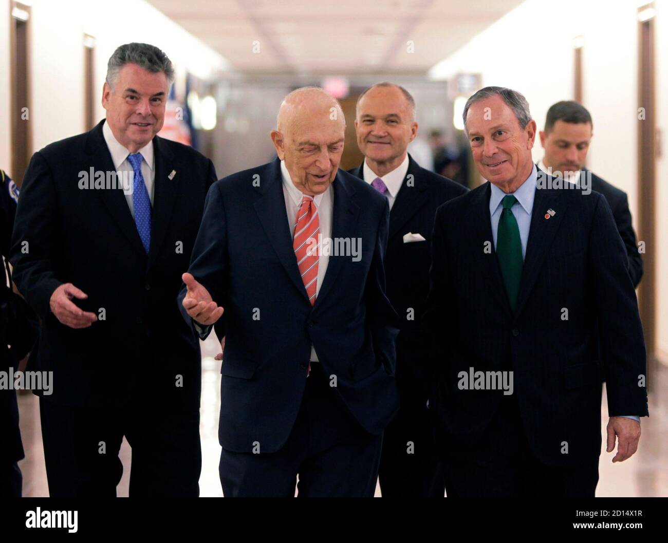 New York City Mayor Michael Bloomberg (2nd R), speaks to Sen. Frank Lautenberg (D-NJ) as they walk down a hallway in Senate Dirksen Building with Rep. Peter King (R-NY) (L) and New York City Police Commissioner Raymond Kelly (3rd R) after their testimony before the Senate Homeland Security and Governmental Affairs Committee on Capitol Hill in Washington May 5, 2010. REUTERS/Yuri Gripas (UNITED STATES - Tags: POLITICS CRIME LAW) Stock Photo