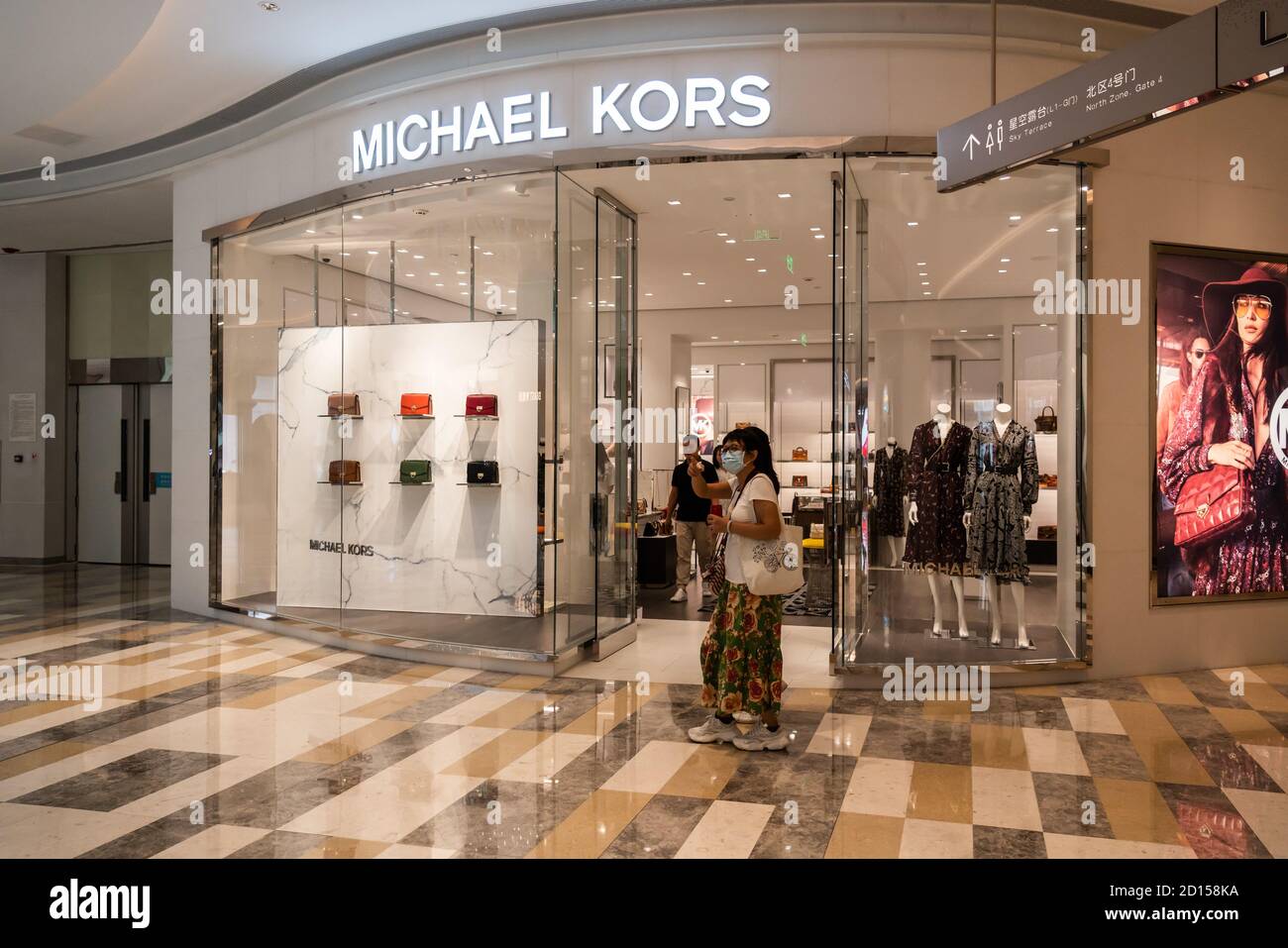 Shenzhen, China. 5th Oct, 2020. Pedestrians walk past an American fashion  brand Michael Kors store. Credit: Alex Tai/SOPA Images/ZUMA Wire/Alamy Live  News Stock Photo - Alamy