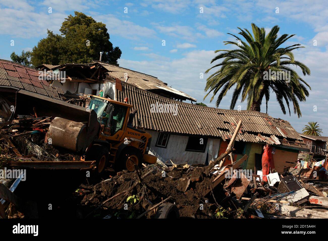 Workers Clean Up Debris After A Major Earthquake And Ensuing Tsunami Caused Massive Destruction In Constitucion March 3 2010 Four Days After The 8 8 Magnitude Earthquake Killed Around 800 People In South Central Chile