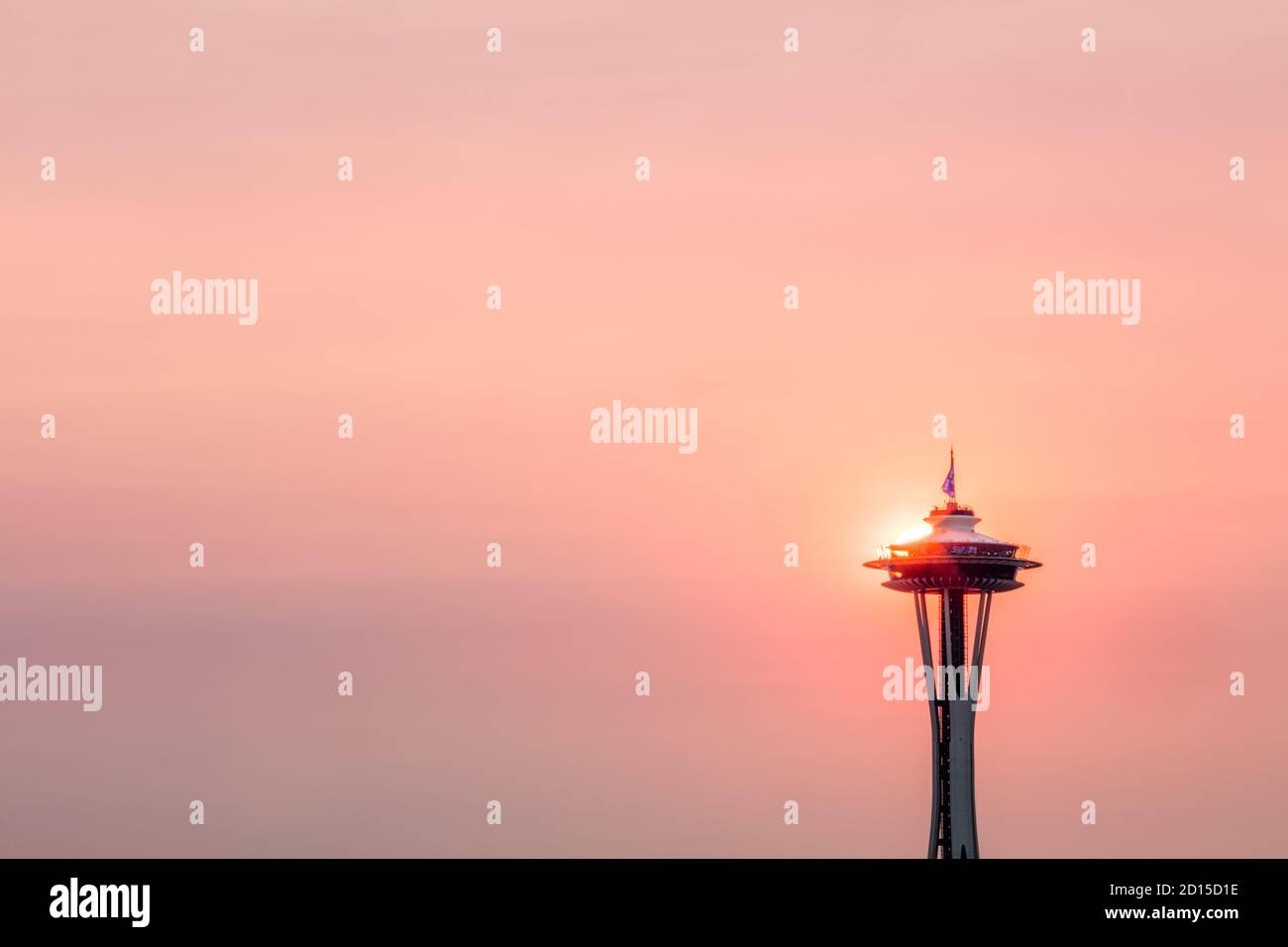 The Iconic Space Needle in Seattle, Washington, at sunset, with brilliant colors caused by clouds and smoke from the fires in western US fires in Sept Stock Photo