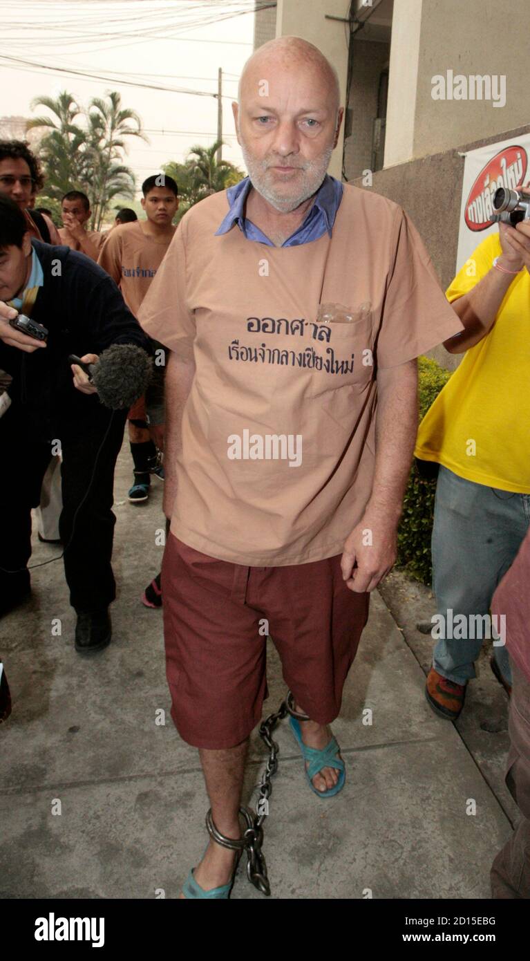 Swiss Oliver Rudolf Jufer, 57, arrives at a Chiang Mai court, 700 km (310 miles) north of Bangkok March 12, 2007. A lese majeste trial against Jufer, arrested for defacing portraits of Thailand's King Bhumibol Adulyadej on the revered monarch's birthday in December last year, began in a confidential hearing on Monday as the court did not want details of the offence against the monarch to be heard. If found guilty, he faces 75 years in jail.  REUTERS/Sukree Sukplang (THAILAND) Stock Photo