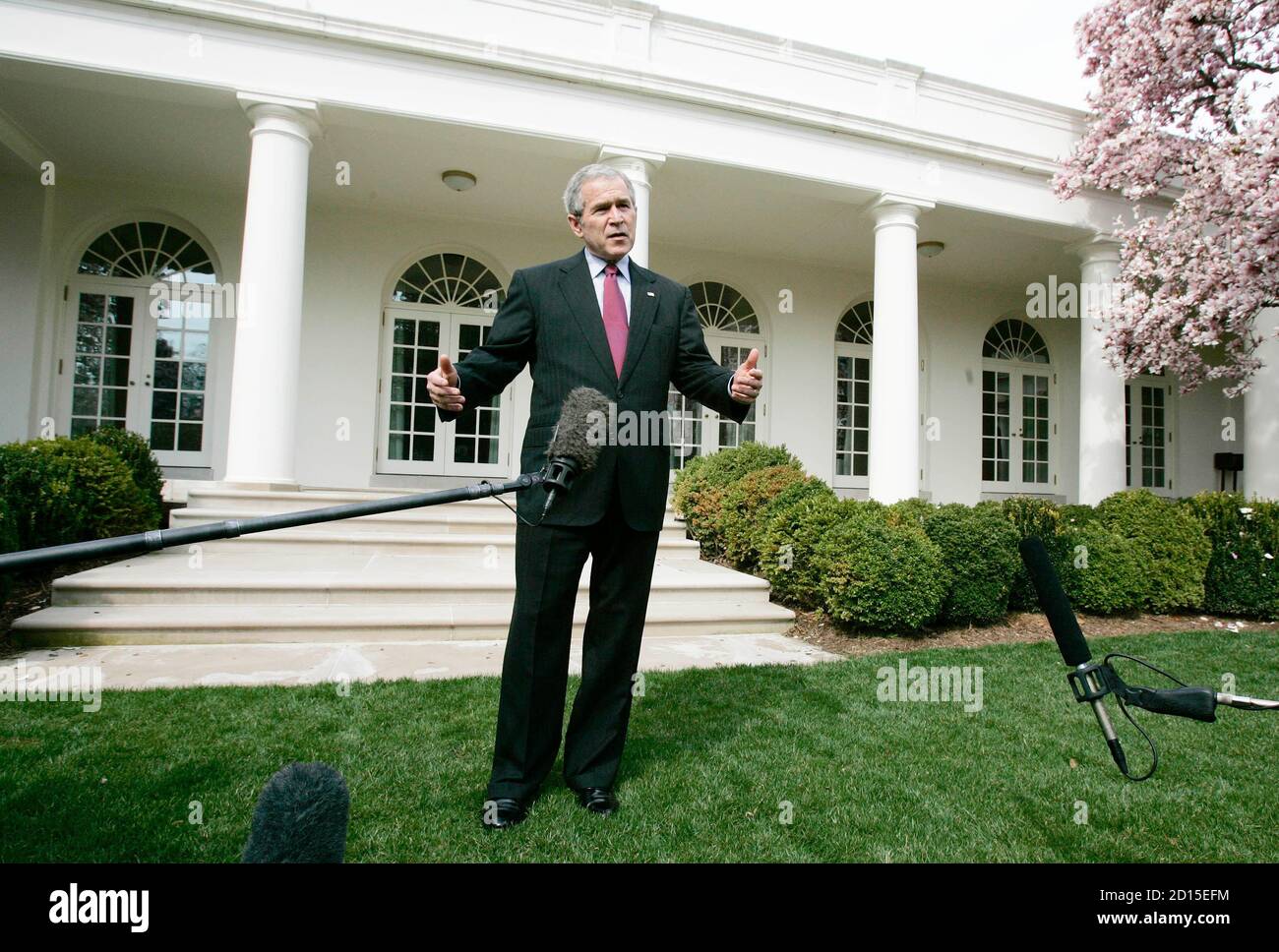 U.S. President George W. Bush talks about Press Secretary Tony Snow's phone call to him this morning informing Bush of his reoccurring cancer while in the Rose Garden of the White House in Washington March 27, 2007.    REUTERS/Larry Downing (UNITED STATES) Stock Photo