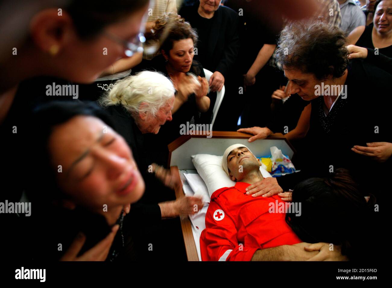 Relatives And The Mother R Of Lebanese Red Cross Worker Haitham Slaiman Who Was Killed During Fighting Between The Lebanese Army And Islamist Militants In The Palestinian Nahr Al Bared Refugee Camp Mourn