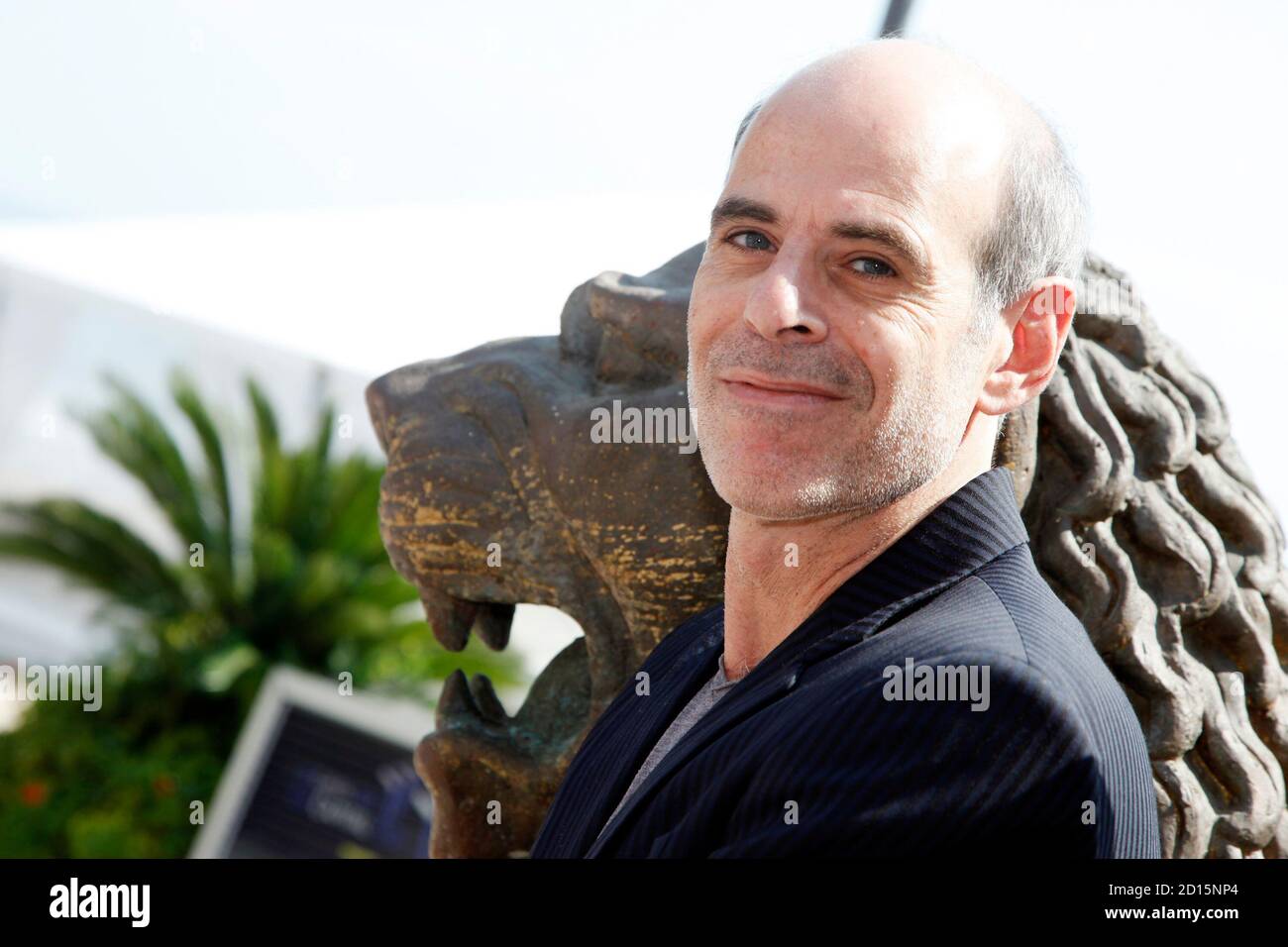 Director Samuel Maoz looks on as he stands next to a copy of Gold Lion award during the 66th Venice Film Festival September 10, 2009.   REUTERS/Alessandro Bianchi   (ITALY ENTERTAINMENT) Stock Photo
