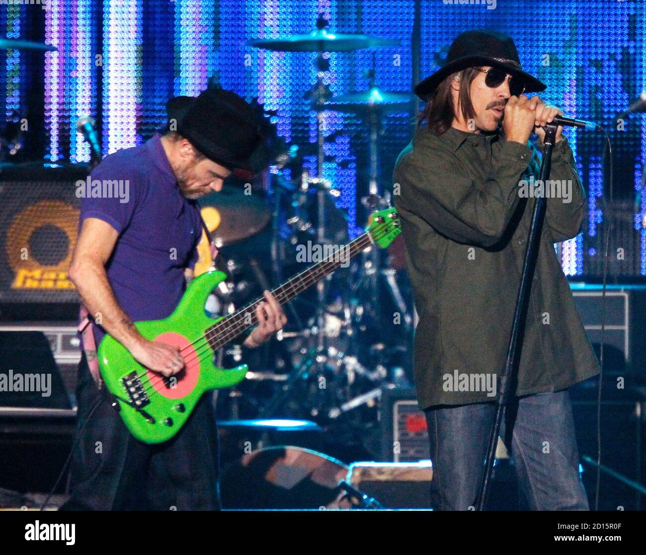 Anthony Kiedis R And Michael Flea Balzary Of Red Hot Chili Peppers Perform A Man Needs A Maid At The 10 Musicares Person Of The Year Tribute Honoring Recording Artist Neil Young