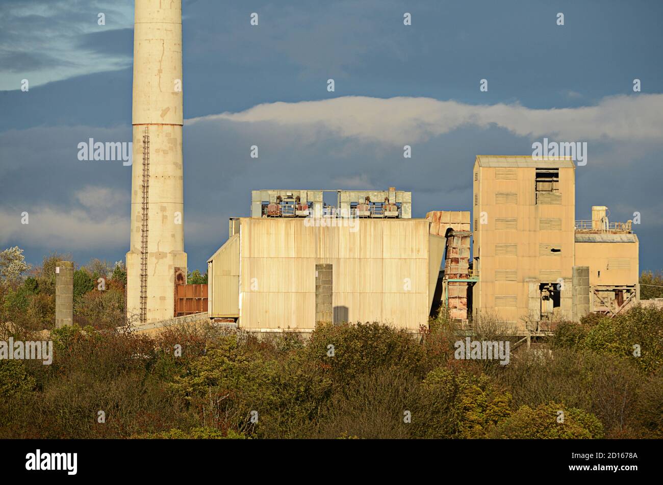 Quarry building in Ferryhill in County Durham. The chimney stack is a local landmark. The site of significant importance for dolomite mining. Stock Photo