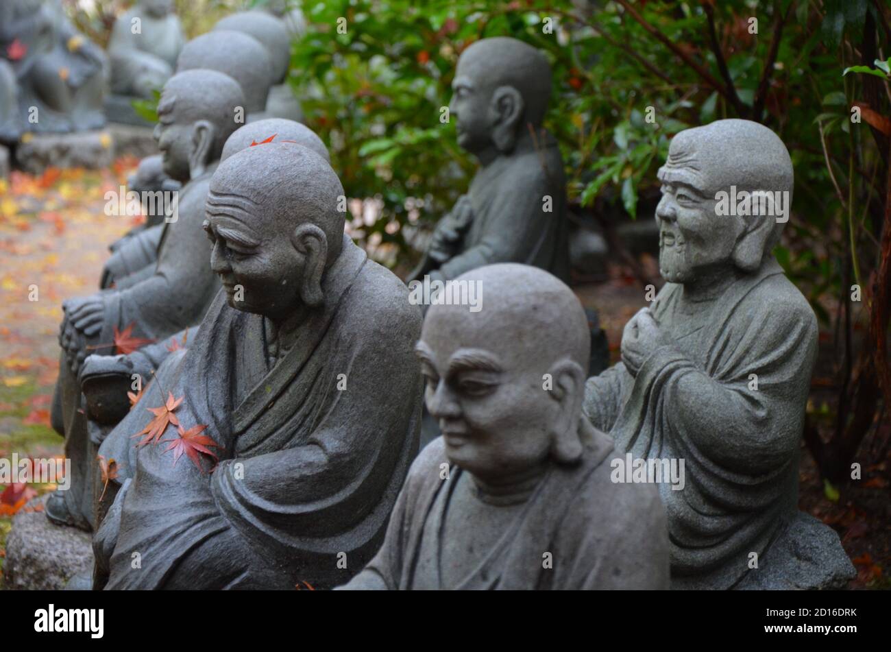 Statues of the followers of Buddha (called Shaka Nyorai in Japan at Daisho-in Temple (Daishoin Temple), Miyajima, Japan. Stock Photo