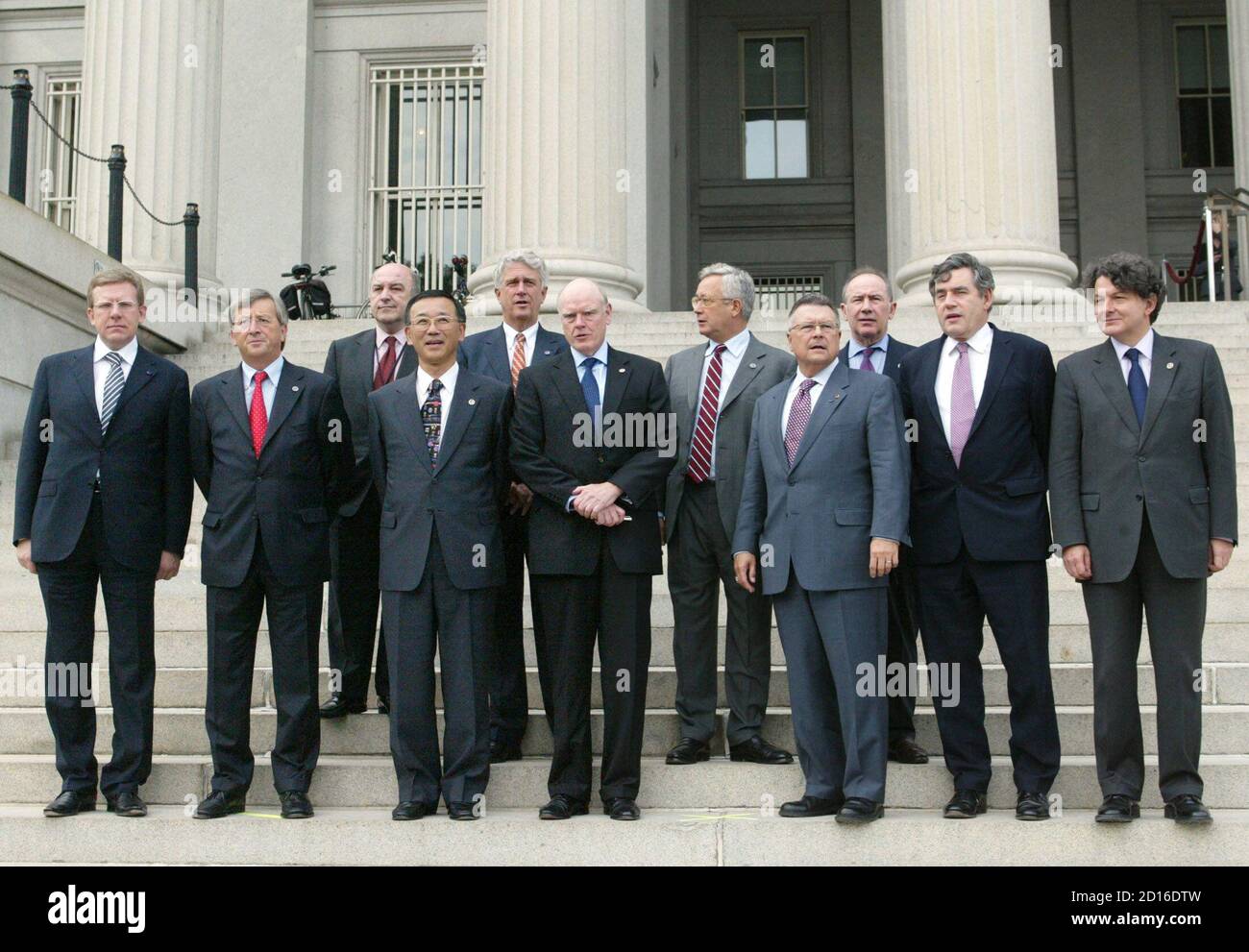 G7 finance ministers pose for a group photo outside the Treasury Department  after their meeting in Washington September 23, 2005. From left to right  are Aleksey Kudrin, Russian Finance Minister, Jean-Claude Juncker,