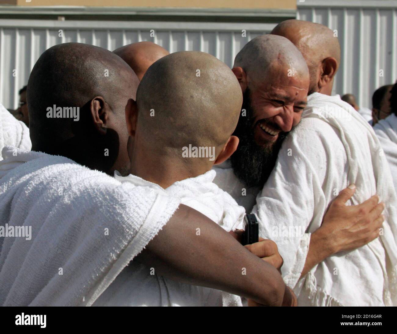 Muslim Pilgrims Hug Each Other After Shaving Their Heads On The First Day Of Eid Al Adha After Throwing Stones At Pillars Symbolizing Satan In Mena Outside Mecca December 30 06 Reuters Ali Jarekji Muslim Pilgrims Hug Each Other After Shaving Their Heads On The First Day Of Eid Al Adha After Throwing Stones At Pillars Symbolizing Satan In Mena Outside Mecca December 30 06 Reuters Ali Jarekji