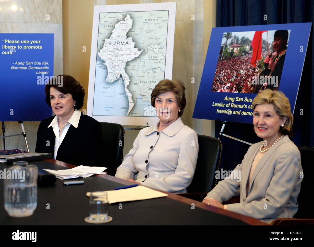 U.S. first lady Laura Bush (C) with Sens. Dianne Feinstein (D-CA) (L) and Kay Bailey Hutchison (R-TX) attend a meeting of the Senate Women's Caucus on Burma on Capitol Hill in Washington May 23, 2007. REUTERS/Yuri Gripas (UNITED STATES) Stock Photo