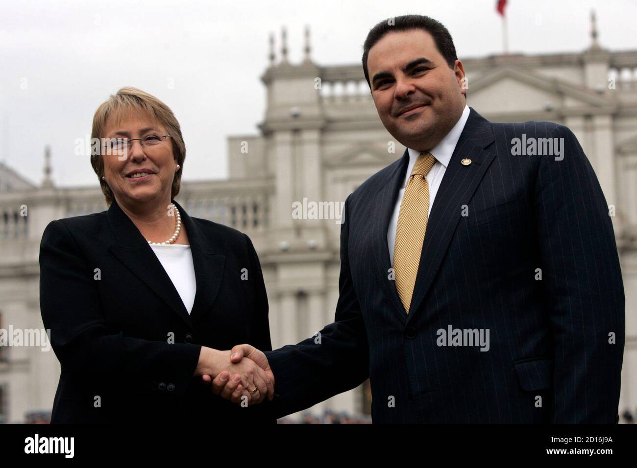 Chile S President Michelle Bachelet Shakes Hands With Her Salvadorean Counterpart Tony Saca Outside The Government Palace In Santiago July 5 07 Reuters Victor Ruiz Caballero Chile Stock Photo Alamy