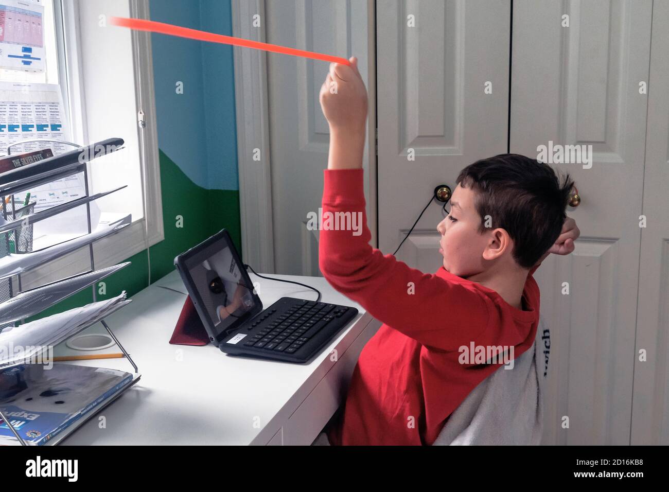 Break,4nd grade student during distance learning class, Washington state, USA, Stock Photo