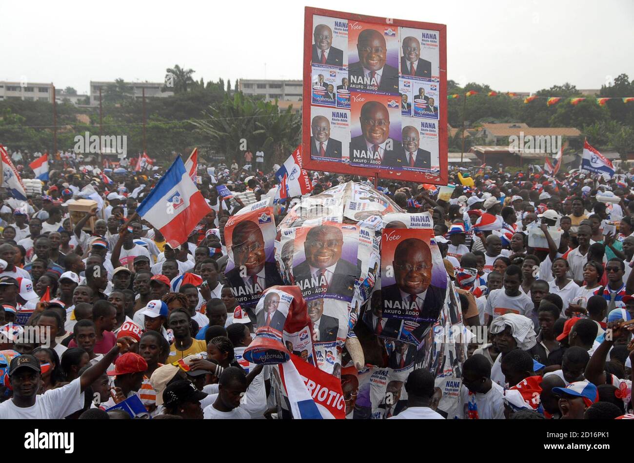 Supporters Of Ghana S Ruling New Patriotic Party Npp Carry Campaign Posters Of Their Presidential Candidate Nana Addo Dankwa Akufo Addo During A Rally At Accra Academy School Park In Accra December 5 08