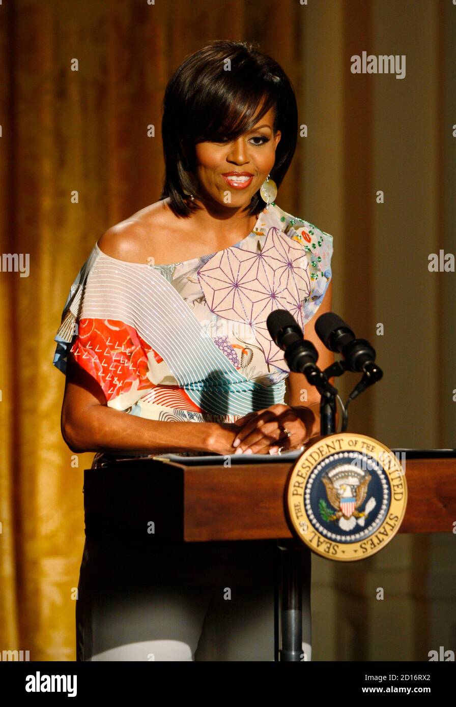 U.S. first lady Michelle Obama speaks at the start of an evening of poetry, music and spoken word in the East Room of the White House in Washington, May 12, 2009.     REUTERS/Jason Reed         (UNITED STATES POLITICS) Stock Photo