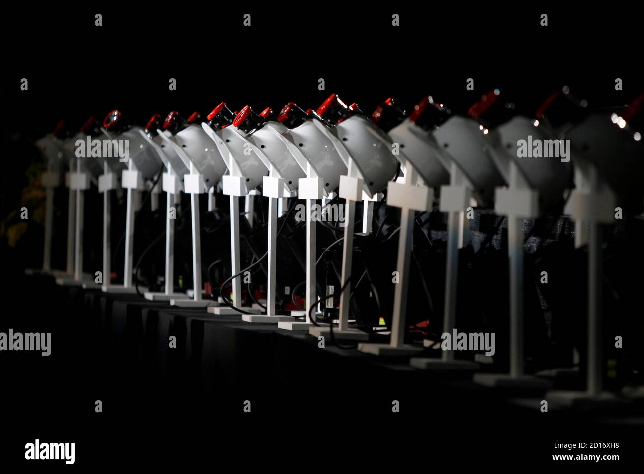 A Row Of 29 Crosses With Mining Helmets And Lights On Them Are Shown During A Memorial Service For The 29 Coal Miners Who Recently Died At Upper Big Branch Mine In