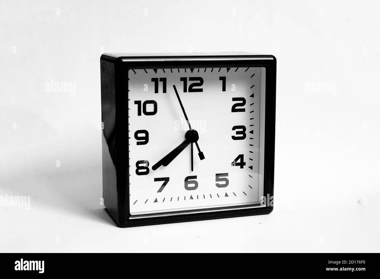 Clock with arrows close up black and white Stock Photo