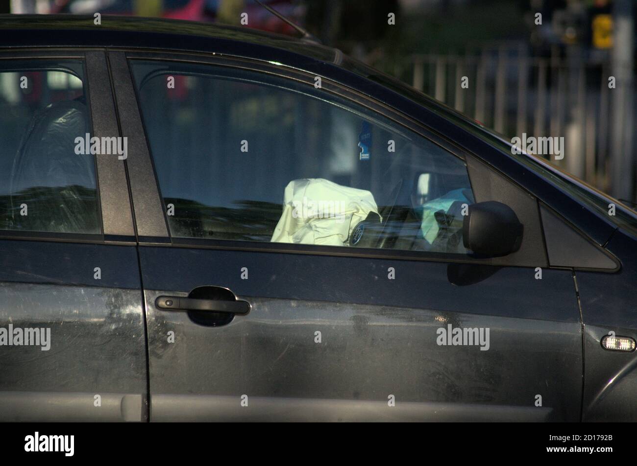 A Ford with its airbag deployed, after a 15-year old crashed a car into a house in Kingstanding, Birmingham which ruptured a gas main Stock Photo