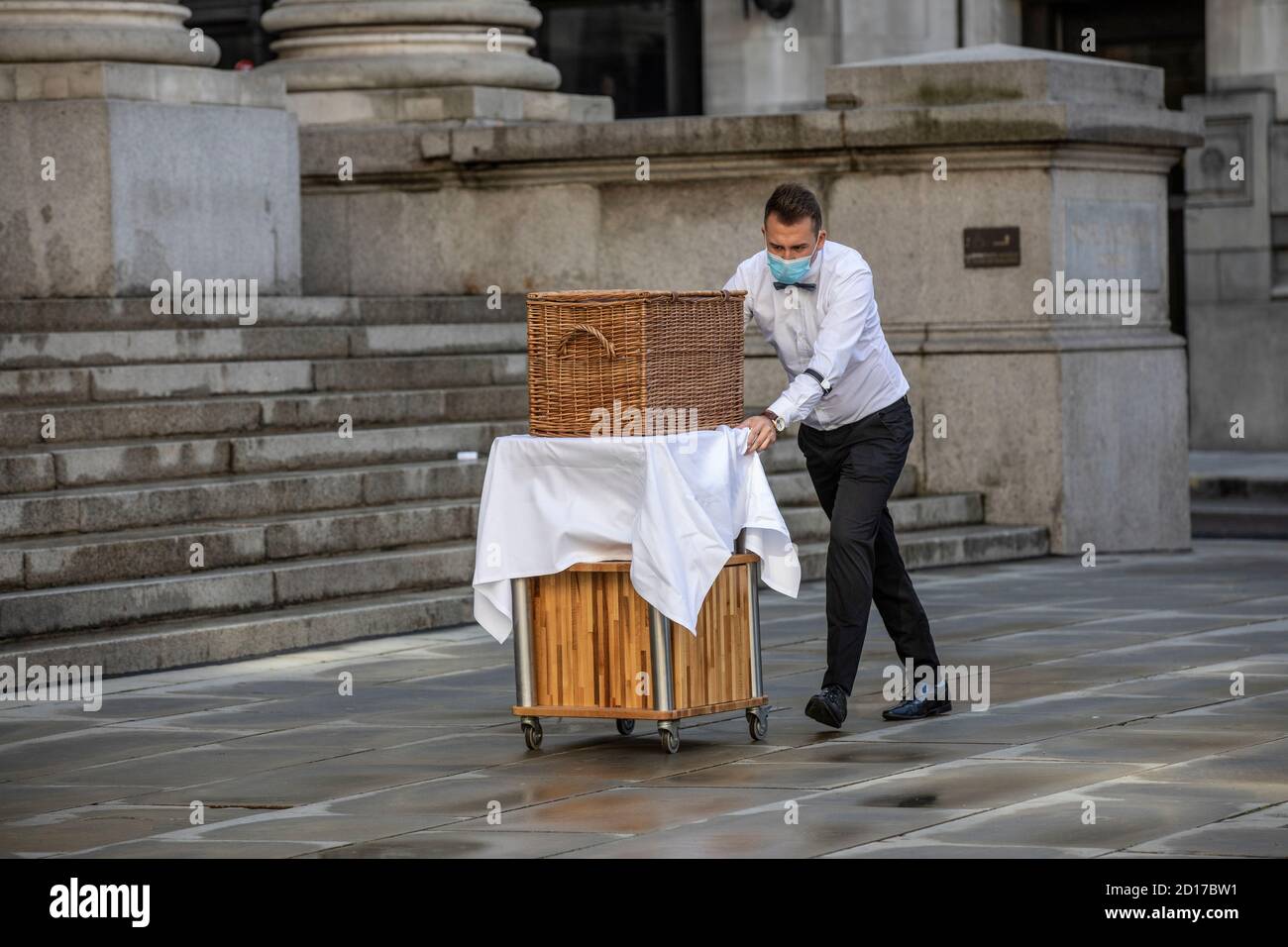 Fortnum & Mason outdoors restaurant is set up outside the Royal Exchange as the coronavirus pandemic continues to keep city workers away, London. Stock Photo