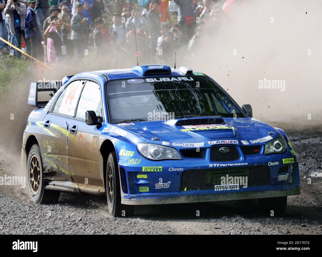 Wrc Driver Toshihiro Arai Of Japan And His Co Driver Tony Sircombe Of Britain Power Through A Corner In Their Subaru Impreza Wrc 06 In Special Stage 23 During The Third Leg Of