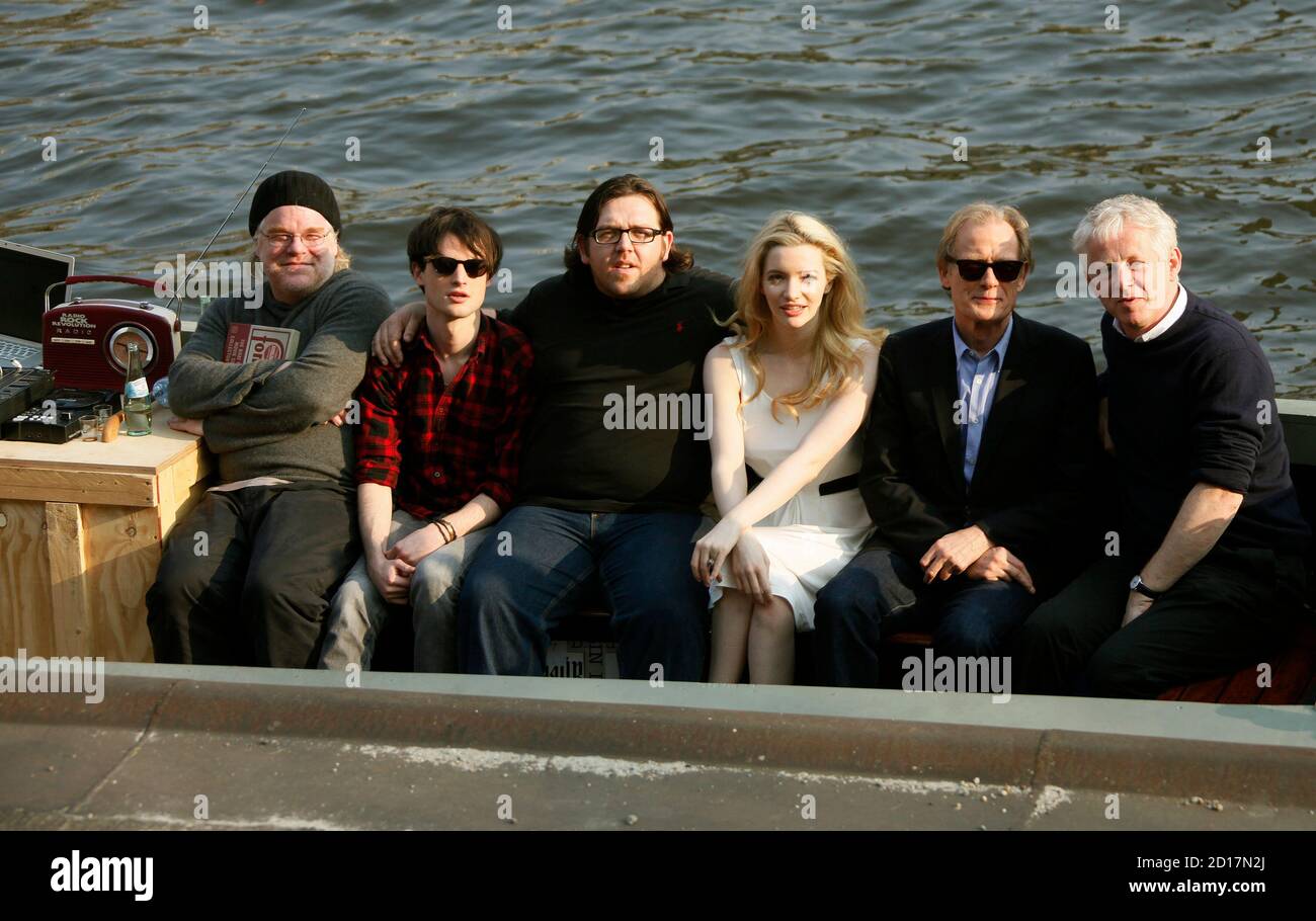 Actors Philip Seymour Hoffman, Tom Sturridge, Nick Frost, Talulah Riley,  Bill Nighy and director Richard Curtis pose for media on a boat to promote  their new movie "Radio Rock Revolution" in Berlin