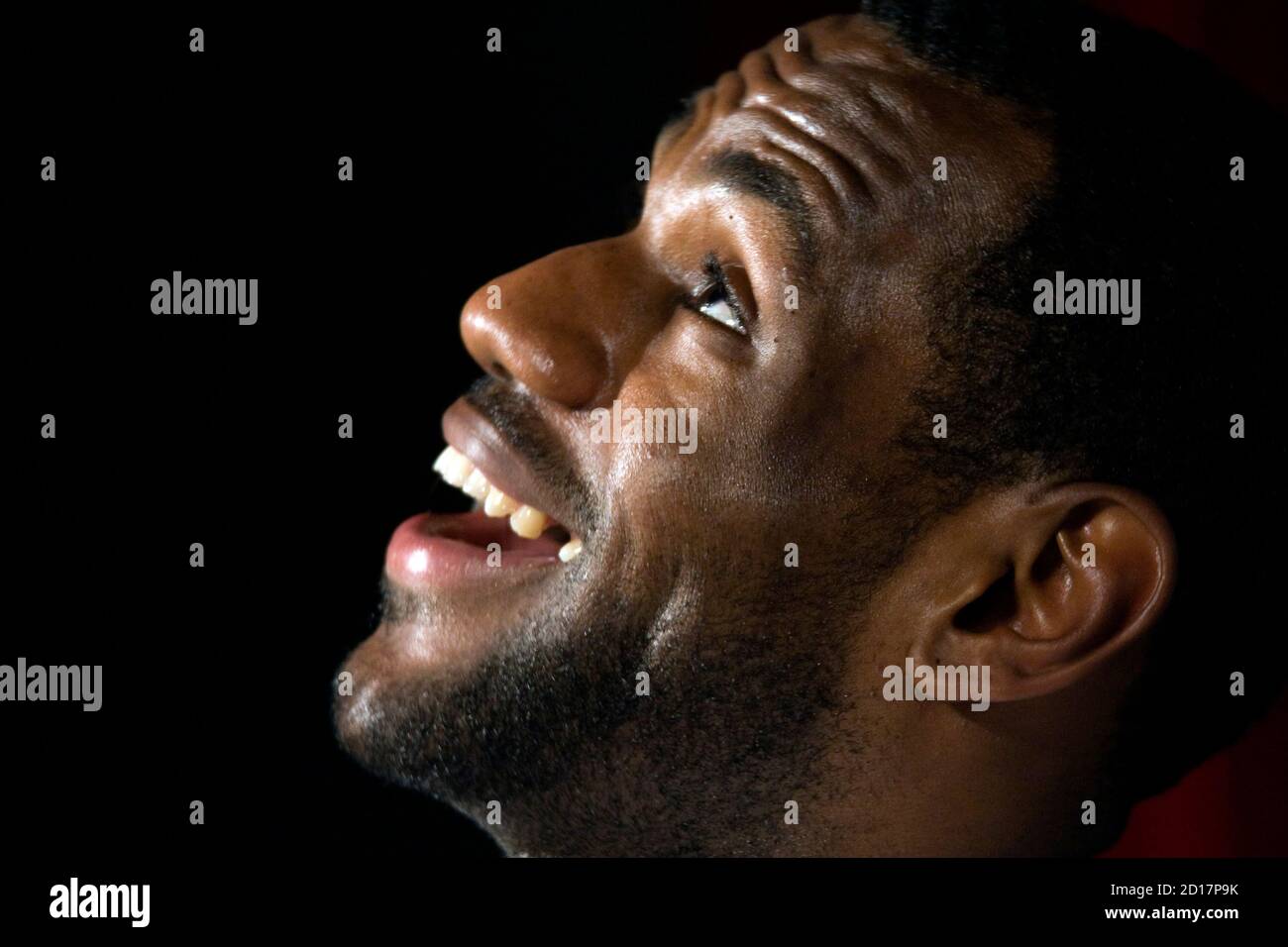 Basketball player LeBron James of U.S. team Cleveland Cavaliers answers  reporters during a promotional event in Paris September 1, 2009. James is  in France on a worldwide tour to promote a new