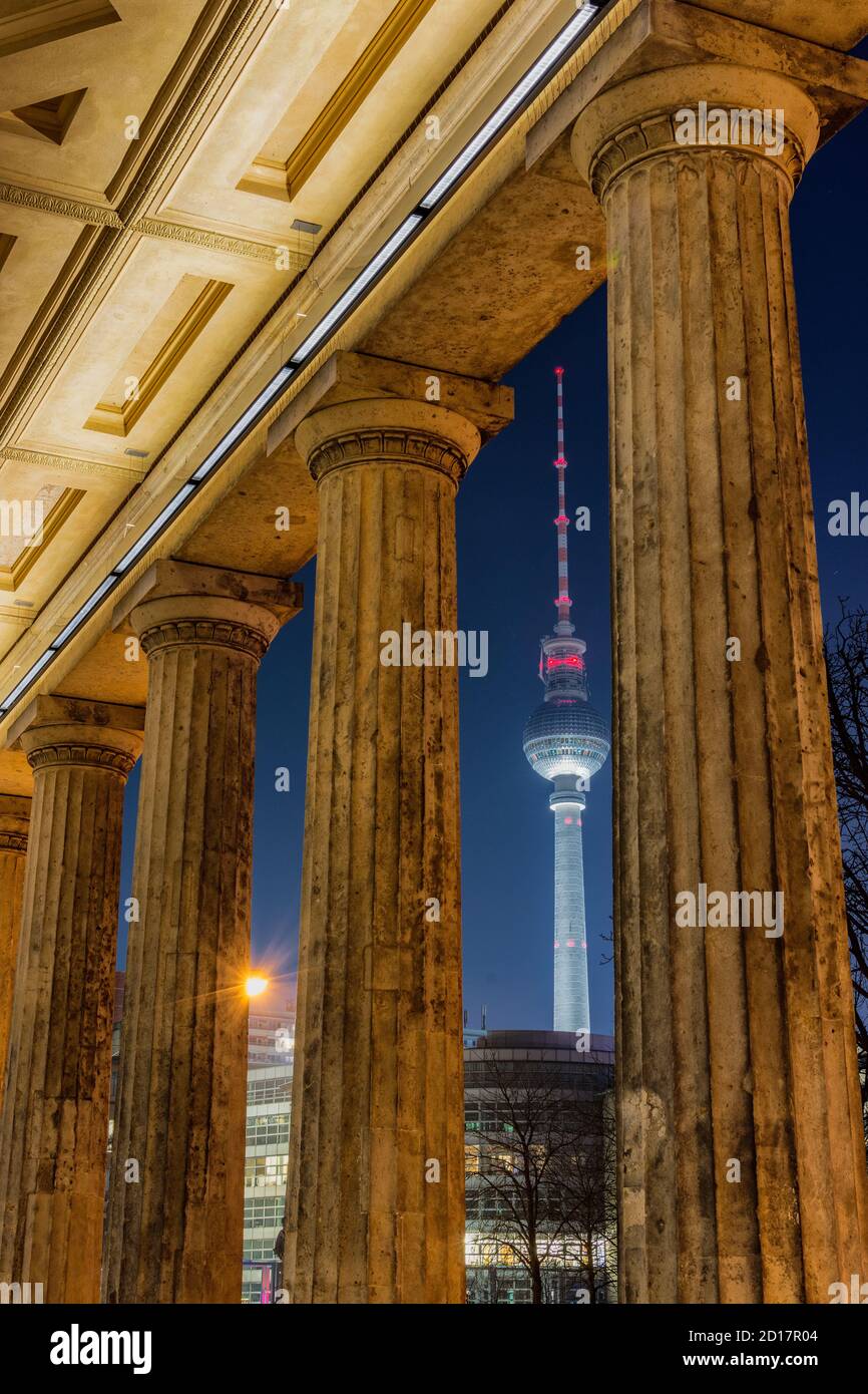 Berlin / Germany - February 13, 2017: Columns of the Museum for Prehistory and Early History in Berlin, with TV Tower (Berliner Fernsehturm) in the ba Stock Photo