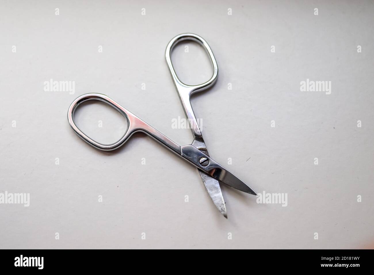Manicure scissors closeup on white background Stock Photo Alamy