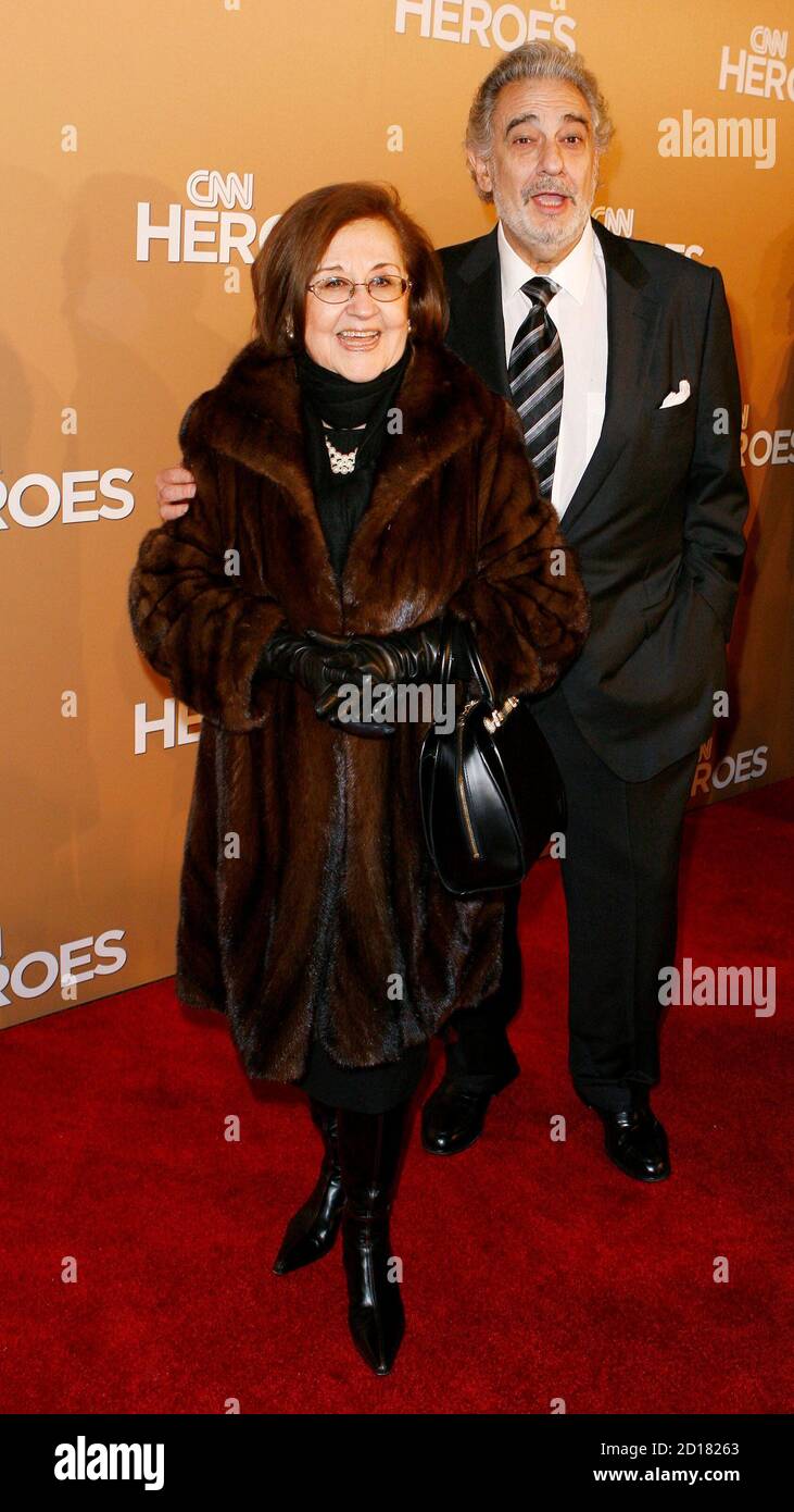 Singer Placido Domingo and his wife Marta Ornelas poses while arriving