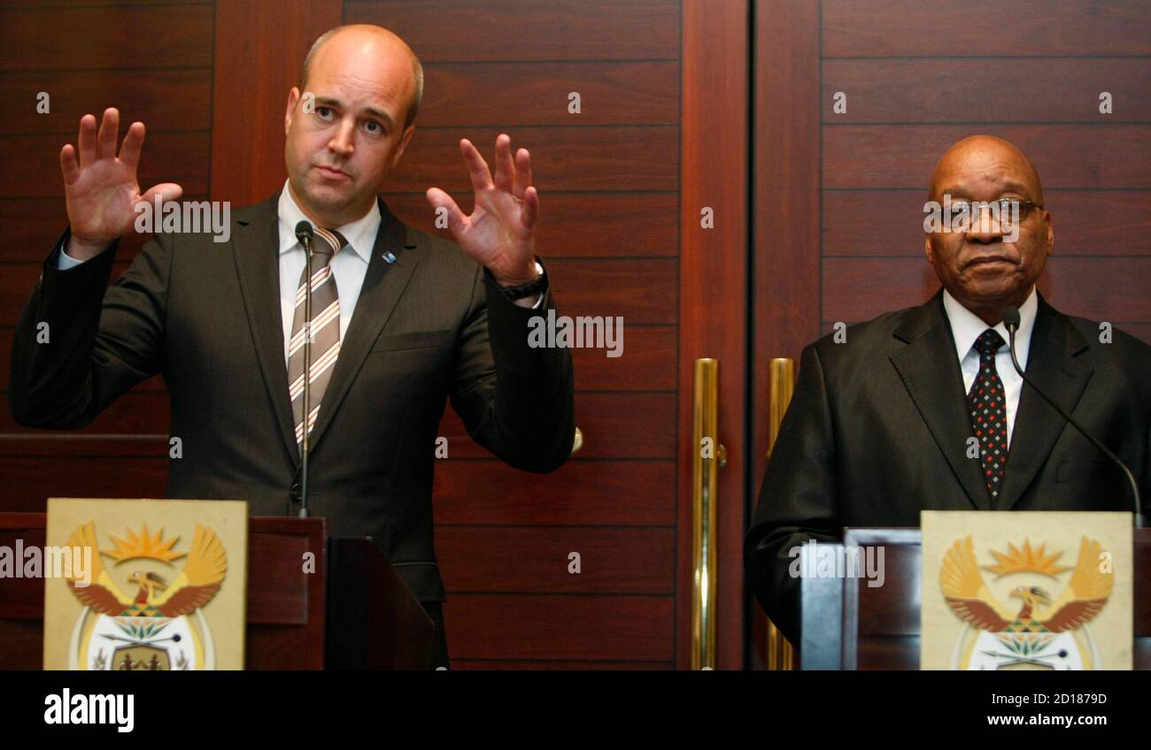 Swedish Prime Minister Fredrik Reinfeldt and South African President Jacob Zuma address a news conference after their meeting in Cape Town, September 10, 2009. Reinfeldt is in Cape Town on a short visit and will attend the 2nd South Africa European Union Summit on Friday. REUTERS/Mike Hutchings (SOUTH AFRICA POLITICS) Stock Photo