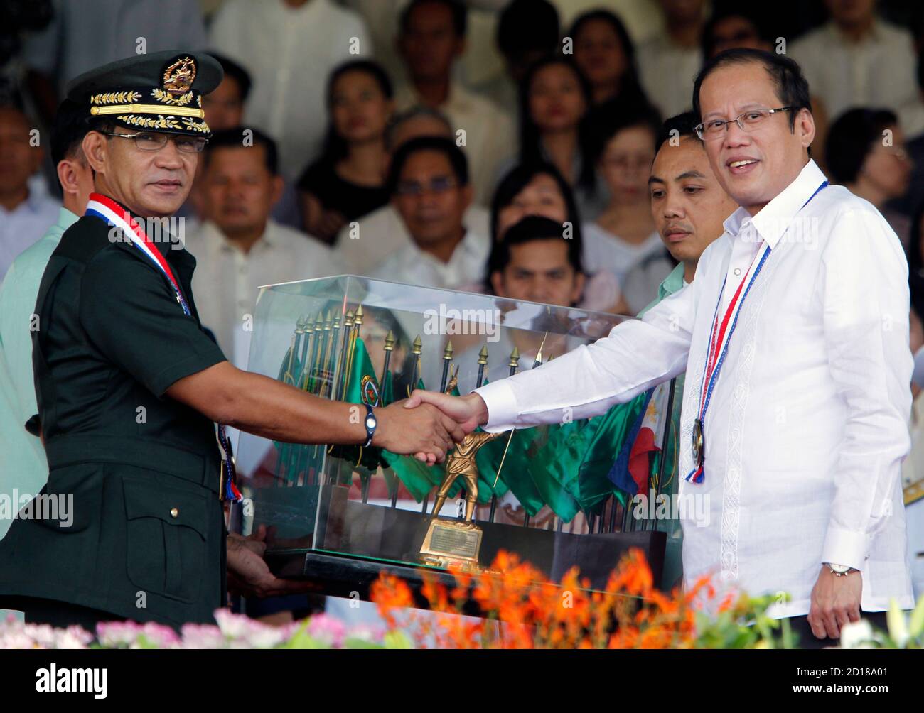 Philippine President Benigno Noynoy Aquino Jr R Greets Newly Installed Commanding General Of The Philippine Army M Gen Arturo Ortiz During The Philippine Army Change Of Command Ceremony At The Fort Bonifacio Army<script async src=