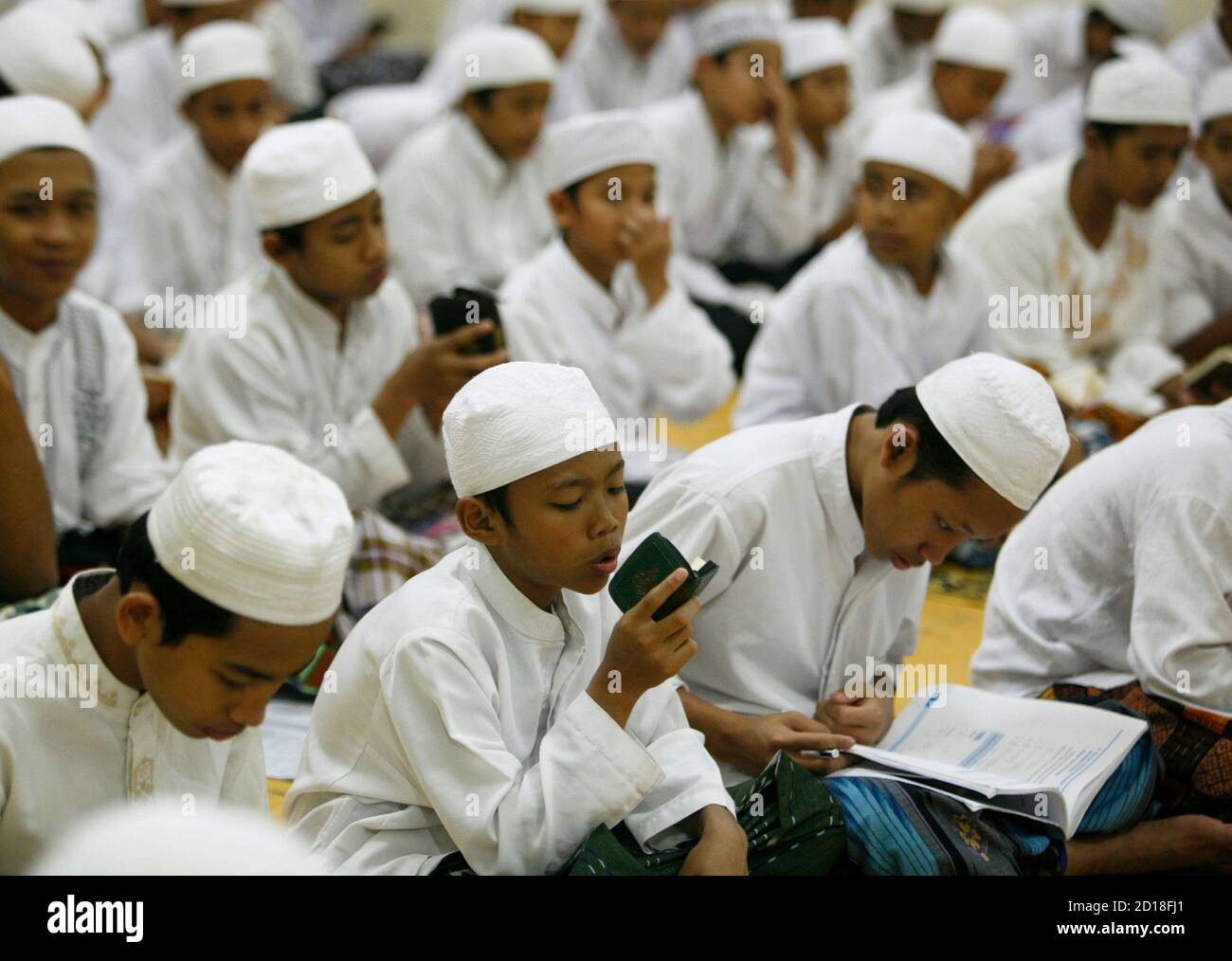 Muslim Students Read The Koran At Al Mukmin Islamic Boarding School In Solo January 14 2008 Picture Taken January 14 2008 Reuters Dwi Oblo Indonesia Stock Photo Alamy<script async src=