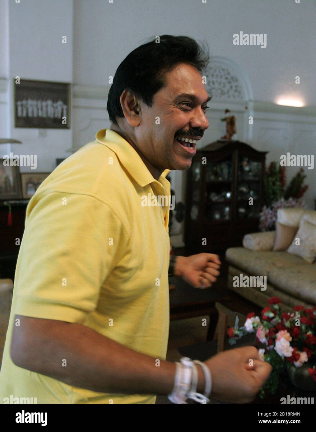 sri-lankan-prime-minister-and-presidential-candidate-mahinda-rajapaksa-speaks-with-reuters-during-an-interview-at-his-official-resident-in-colombo-september-14-2005-sri-lankas-peace-bid-with-the-tamil-tigers-needs-a-fresh-approach-rajapaksa-said-on-wednesday-vowing-to-invite-his-opponents-to-join-forces-in-negotiations-with-the-rebels-if-he-is-elected-president-reutersanuruddha-lokuhapuarachchi-altc-2D18RMN.jpg