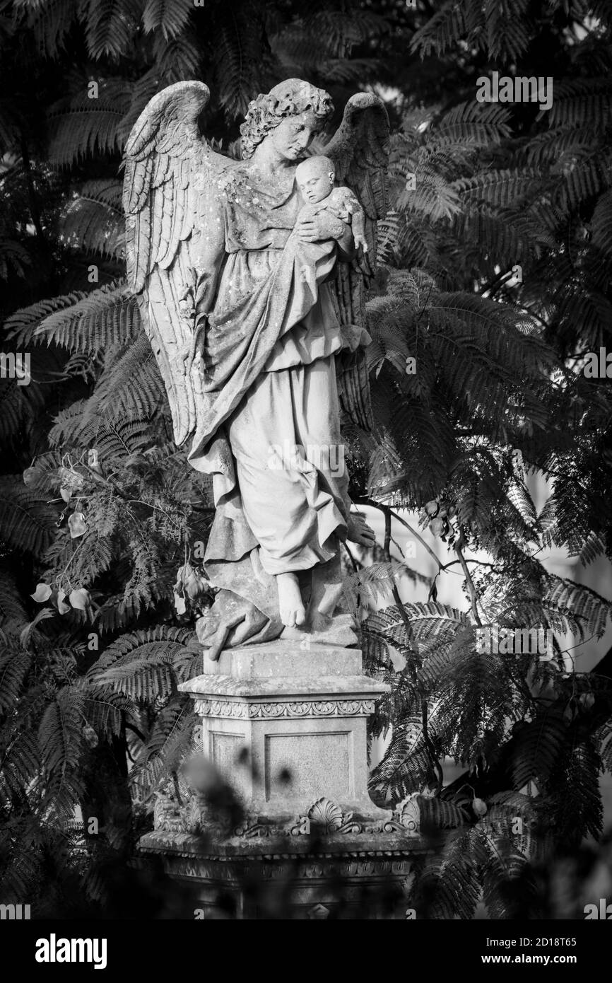 angel con un niño en brazos, cementerio historico de palma, inaugurado el 24 de marzo de 1821,Palma,  Mallorca, islas baleares, Spain Stock Photo