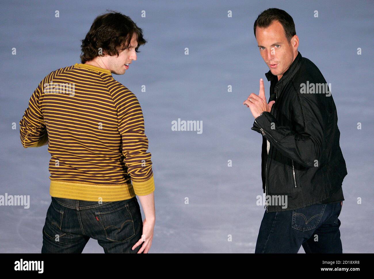 Actors Jon Heder (L) and Will Arnett pose for photographers during a media opportunity at an ice skating rink to promote their film "Blades of Glory" in Sydney June 6, 2007.         REUTERS/Tim Wimborne     (AUSTRALIA) Stock Photo