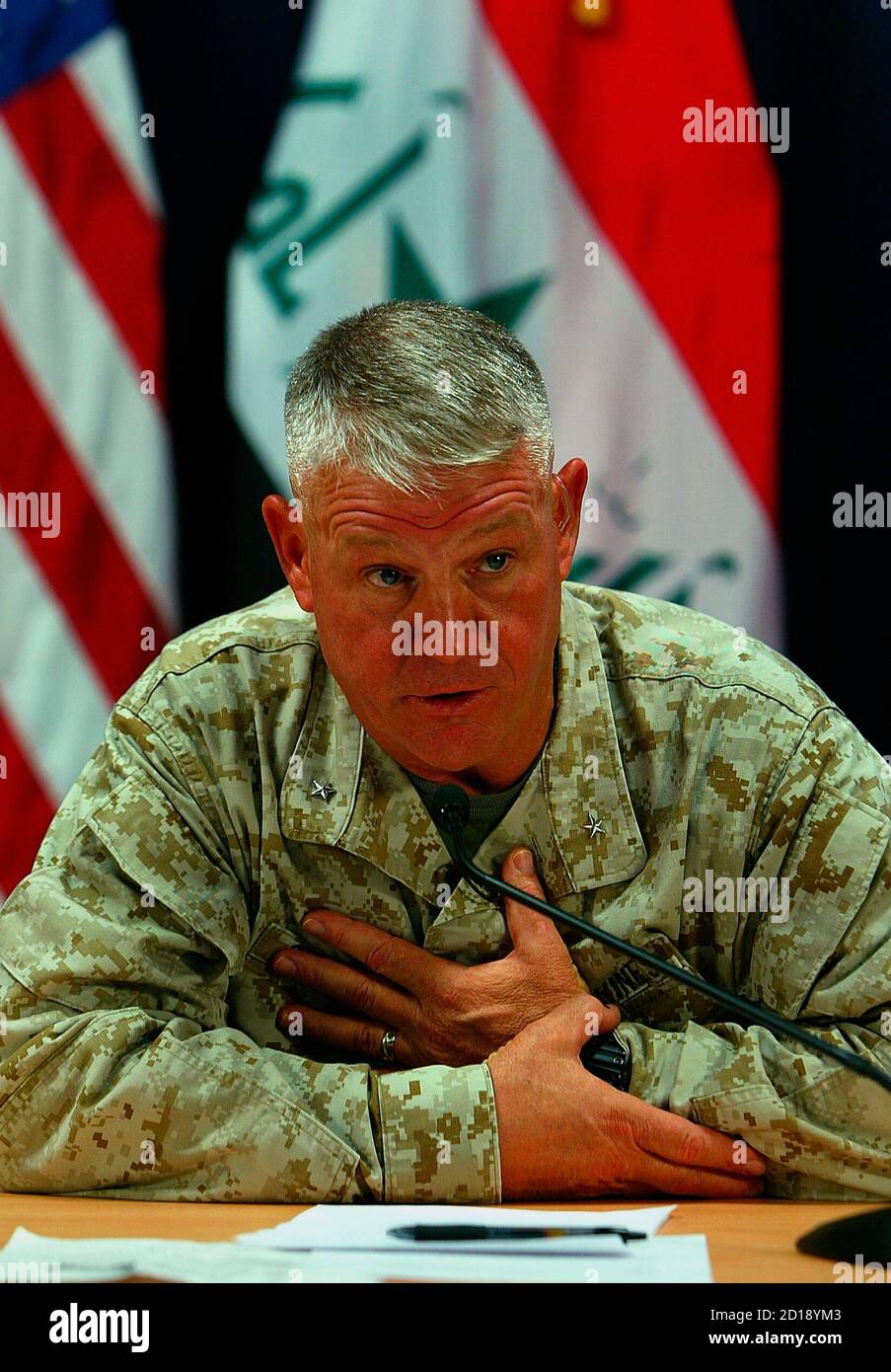 Brigadier General Mark Gurganus, Ground Combat Element commander for the Multinational Force-West, speaks to the media during a news conference with Rear Admiral Mark I. Fox, deputy spokesman for the Multinational Force-Iraq (not pictured), at the heavily fortified Green Zone area in Baghdad September 30, 2007. REUTERS/Wathiq Khuzaie/Pool (IRAQ) Stock Photo