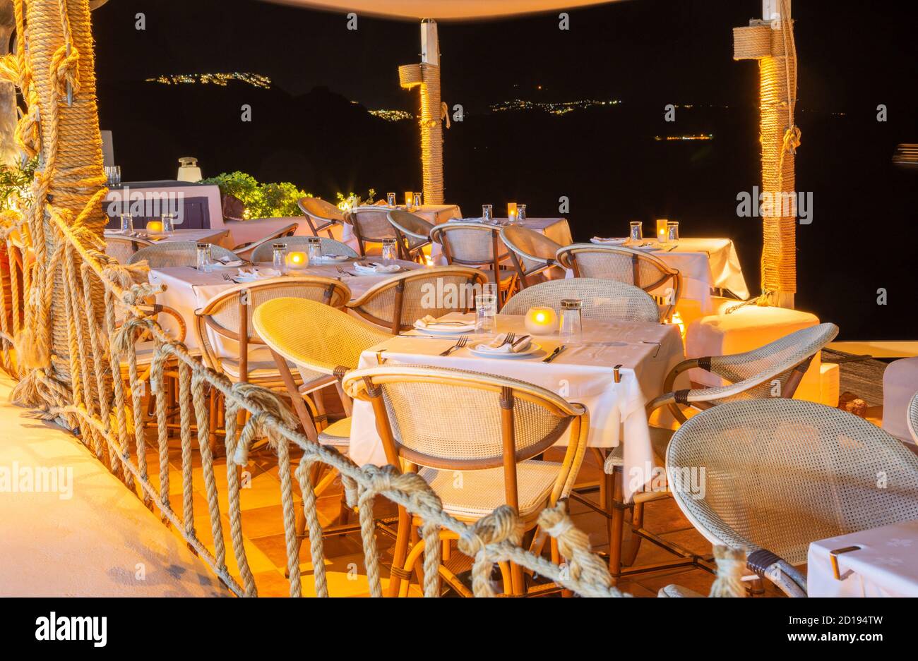 Santorini - The outlook across the restaurant in Oia to Imerovigli and Skaros. Stock Photo