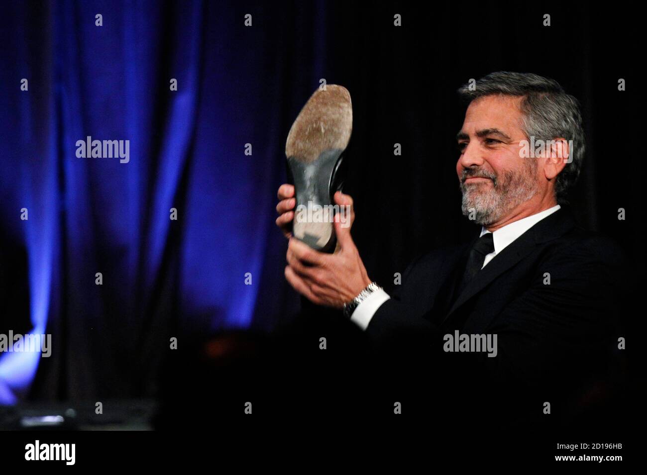 Up In The Air George Clooney High Resolution Stock Photography And Images Alamy Clooney's latest is very good, but what keeps it from being great? https www alamy com actor george clooney takes off his shoe as he goes onstage to accept the award for best actor for his work in up in the air at the national board of review awards in new york january 12 2010 reuterslucas jackson united states tags entertainment images of the day image379445511 html