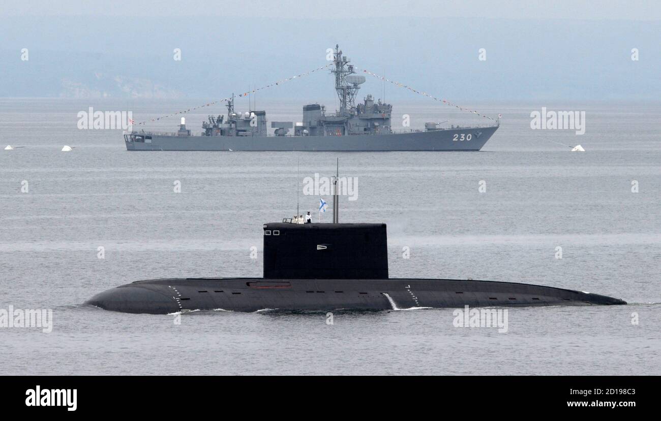 The Japan Maritime Self Defense Force Jmsdf Destroyer Jds Jintsu Background And A Russian Diesel Submarine