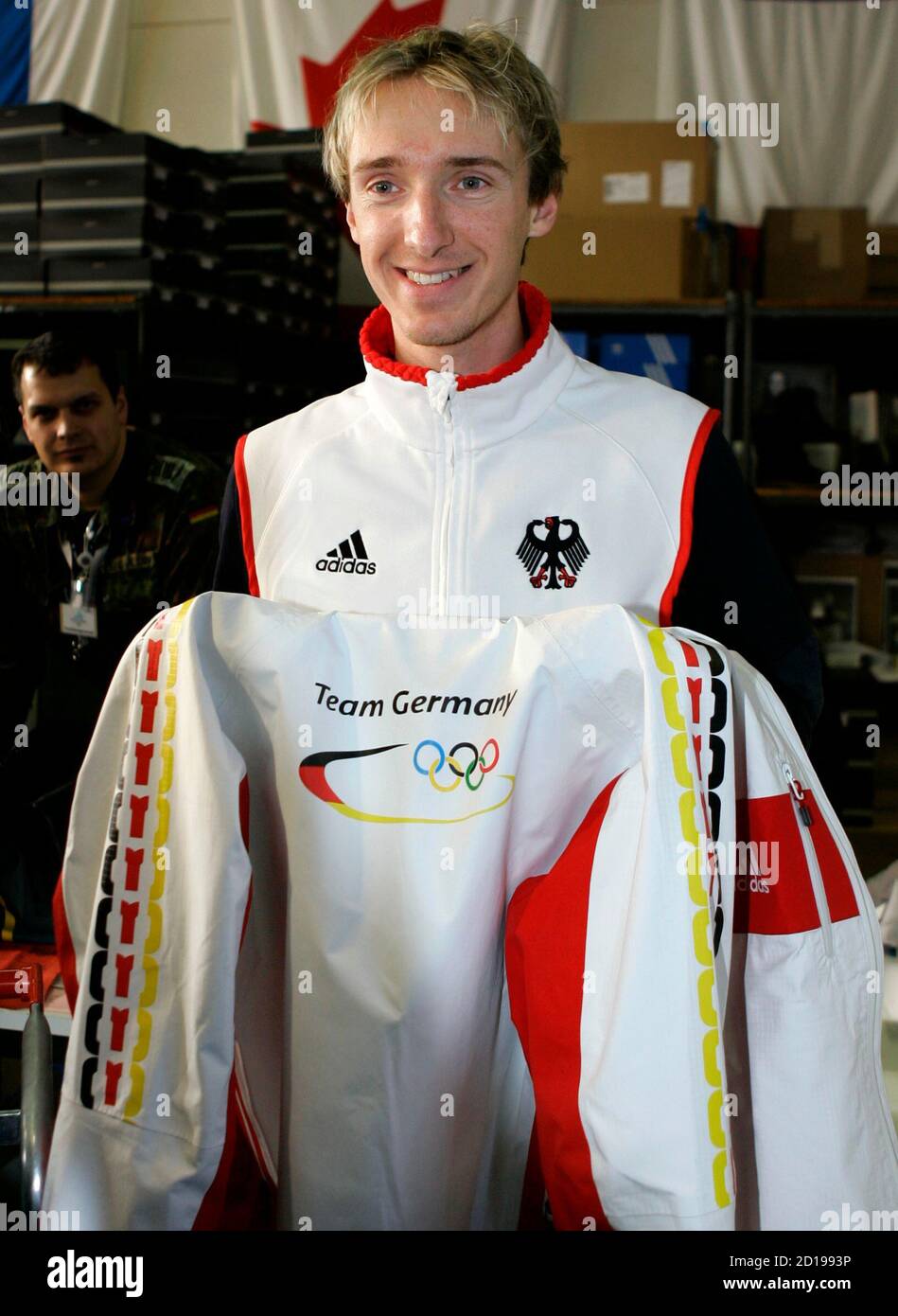 German ski jumper Michael Uhrmann, poses with a jacket during the official  German Winter Olympic kit