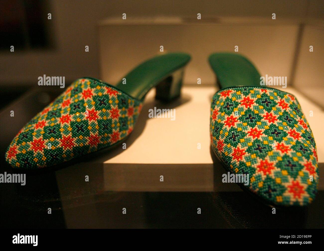 A Pair Of Beaded Slippers Is Seen In A Display Case At The Peranakan Museum In Singapore April 25 2008 The Museum Which Opens In The City State On Saturday Is Touted As