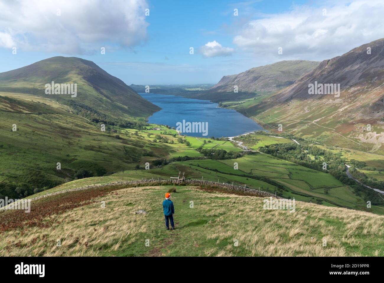 Little boy stood looking at the view from Lingmell across Wastwater Stock Photo
