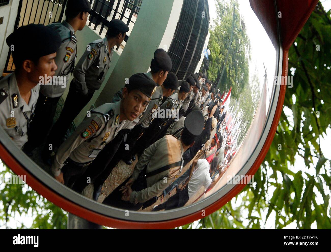 Police Stand Guard In Front Of The Malaysian Embassy In Jakarta August 22 2007 During A Protest Against What The Demonstrators Say Are Abuses Suffered By Indonesian Migrant Workers In Malaysia Around