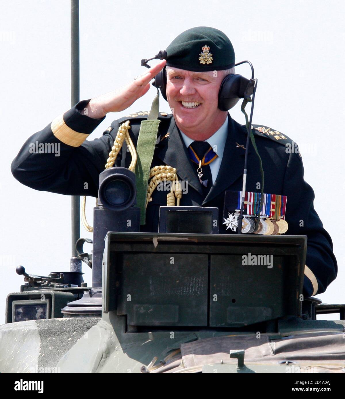 Former Chief of Defence Staff General Rick Hillier salutes from a tank during a change of command ceremony in Ottawa July 2, 2008.       REUTERS/Chris Wattie       (CANADA) Stock Photo