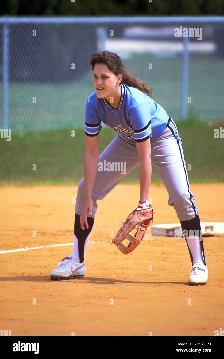 Baseball Softball Action female playing the ready position at 3rd base