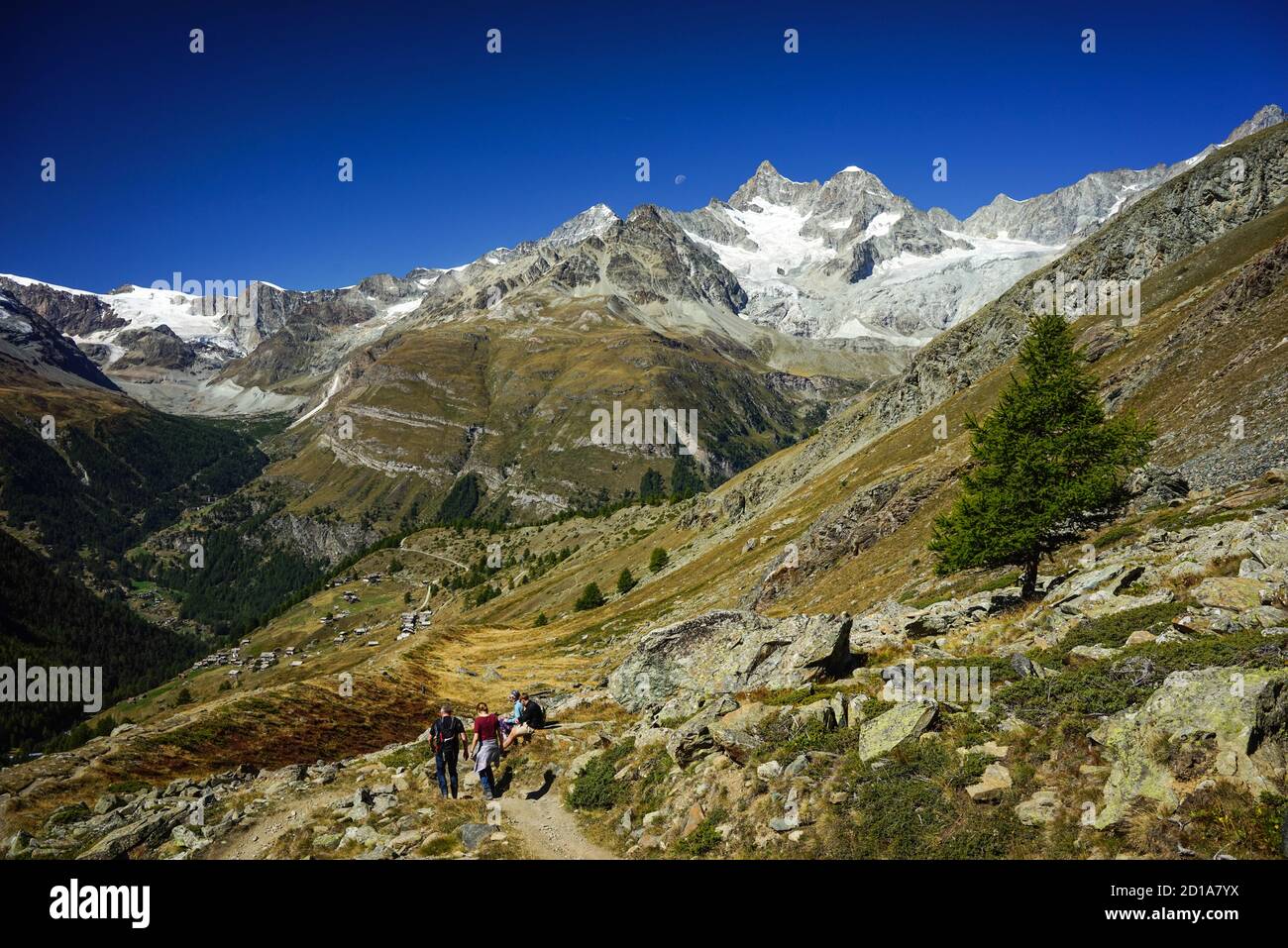 Hiking the Five Lake Trail in Switzerland near Zermatt in summer with