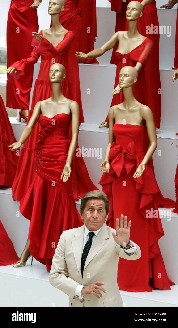 Veteran Italian fashion designer Valentino Garavani waves during the  opening of his exhibition at the Ara Pacis Museum in Rome July 6, 2007.  Valentino will snub Paris and unveil his latest haute