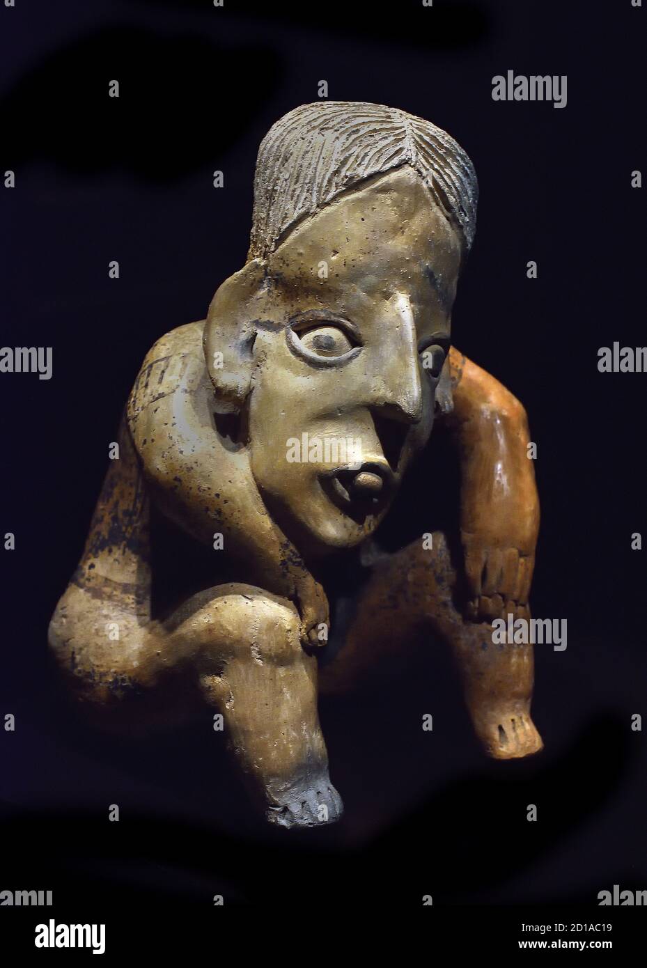 Seated female Estilo Nayarit 400 BC 200 AD Mexico Mexican Anthropomorphic figure represents a deceased with a jade tale between his teeth to pay for the trip to the world Stock Photo