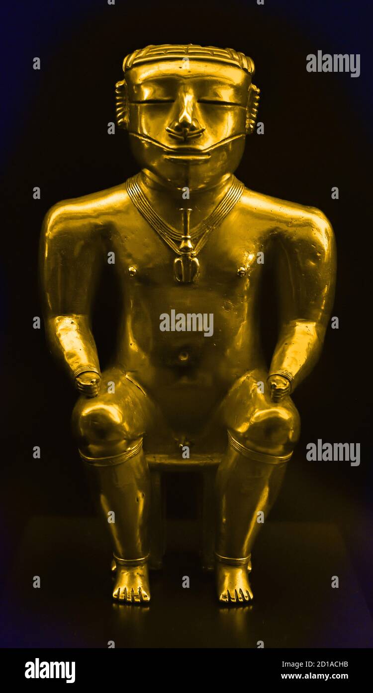The Quimbaya civilization (cacique) was a Pre-Columbian culture of Colombia, 540 - 640 AD  America, American,  ( noted for their gold work characterized by technical accuracy and detailed designs.) Golden Statuette Stock Photo